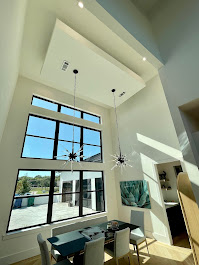 Modern home window tinting - double height windows - Tritek DFW